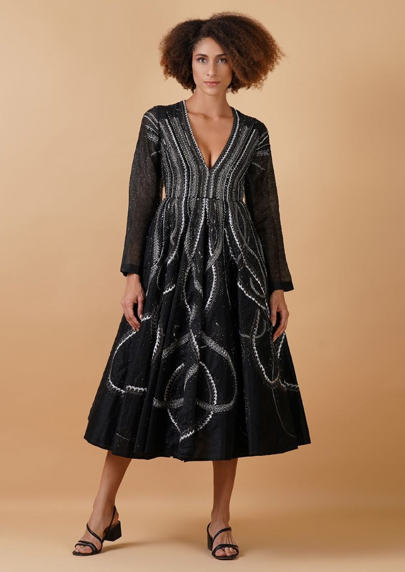 Black cotton silk A-line dress with a plunging V-neckline and full sleeves