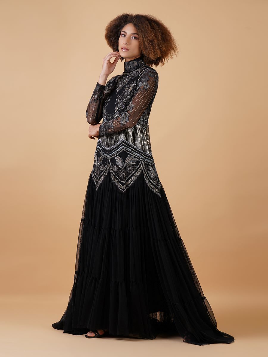 A-line, high neck gown in chanderi at the top that is adorned with unique patterns