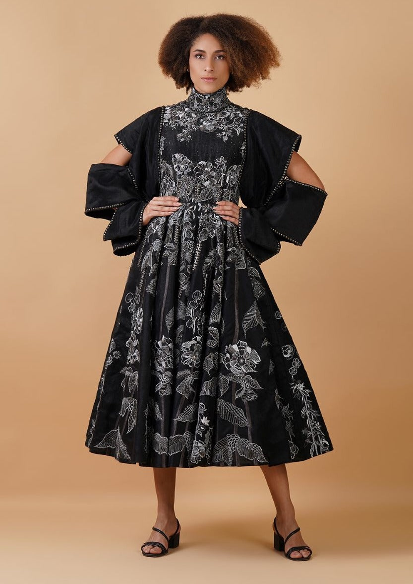 A black chanderi A-line dress that is intricately embroidered