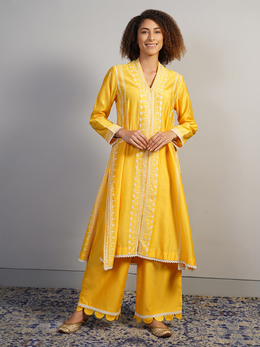 cotton silk suit set adorned with intricate Aari embroidery