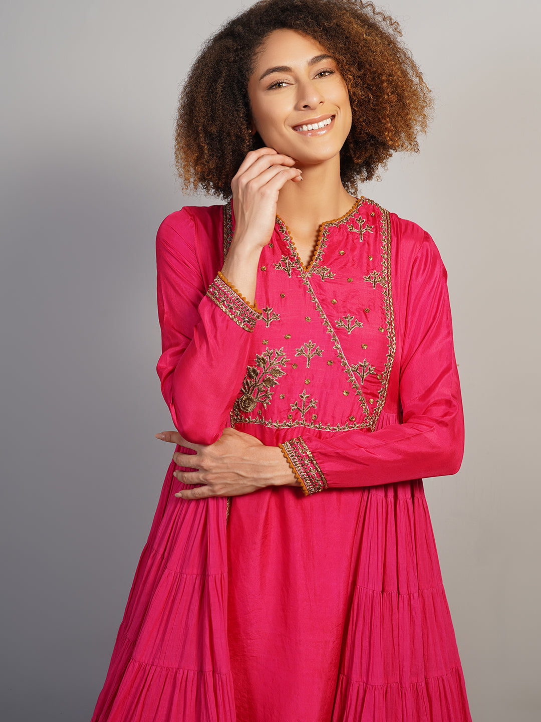 An A-line, tiered kurta in cotton along with silk sleeves