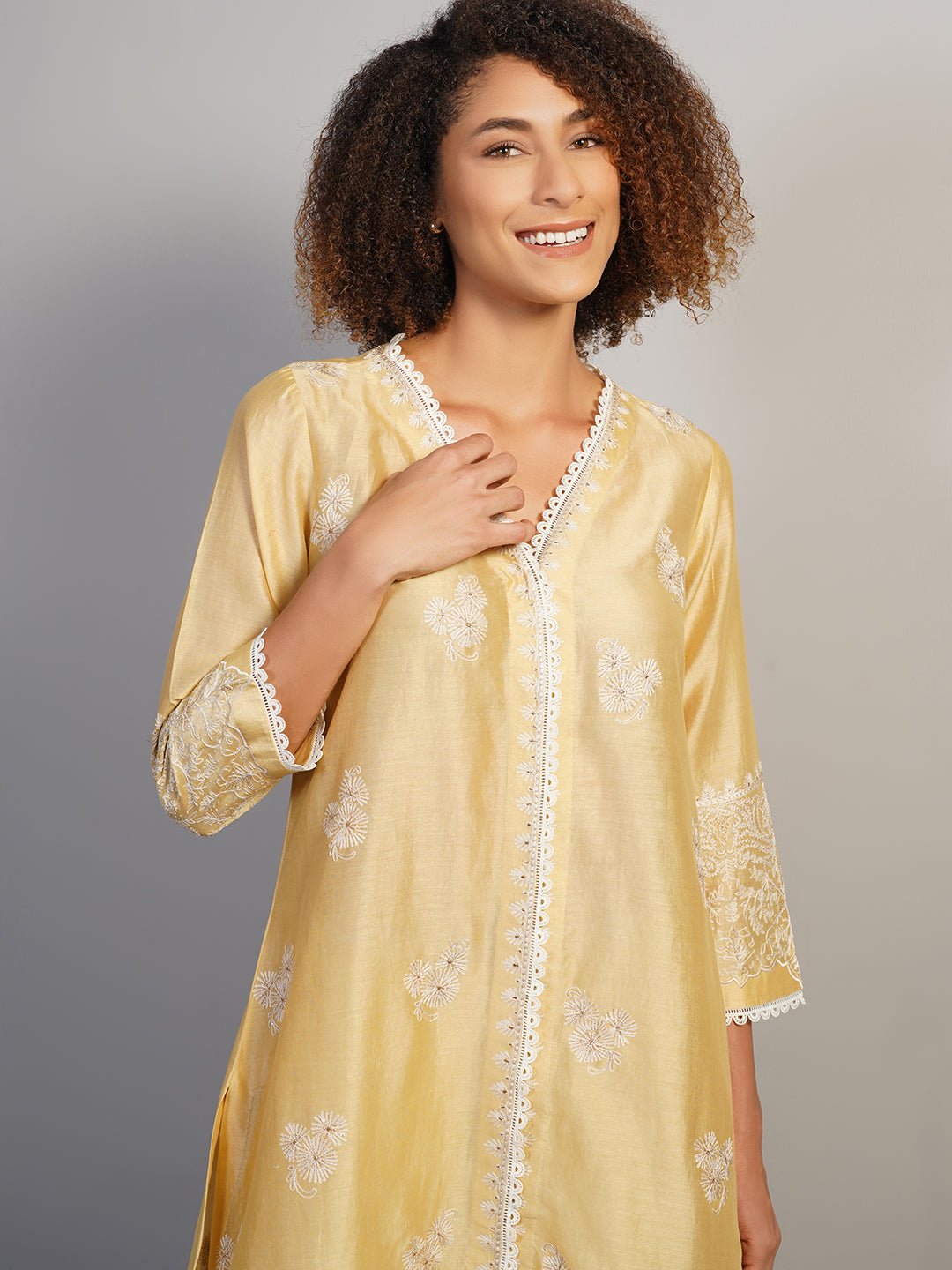 A pleasant, V - neck beige cotton silk suit set that is adorned with subtle aari work embroidery - samantchauhan Apparel & Accessories