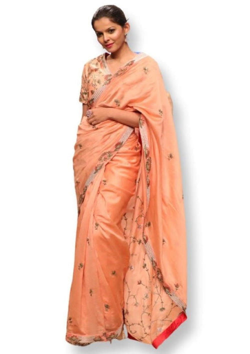 Peach Cotton silk saree and blouse that are embroidered in zari. - samantchauhan