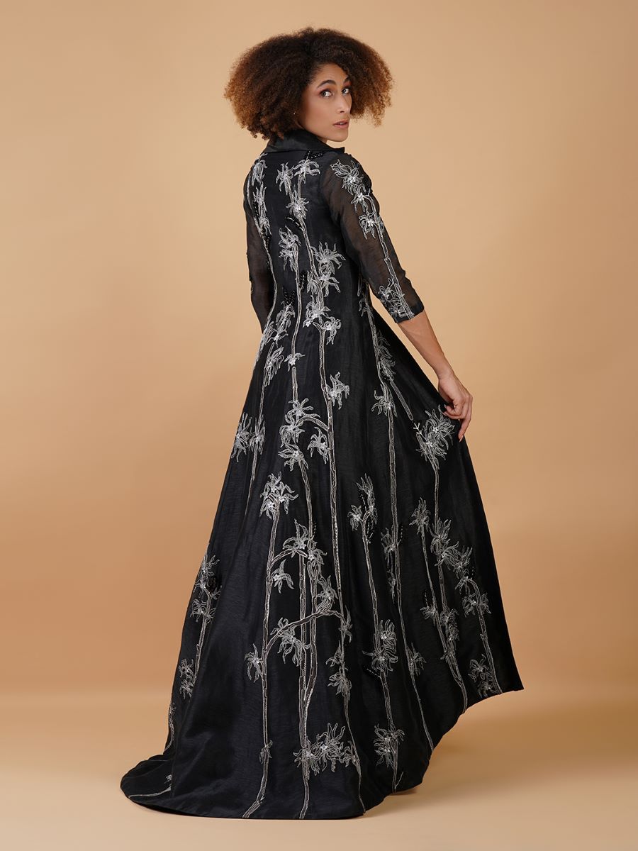 A floor length black chanderi jacket that is adorned with intricate embroideries