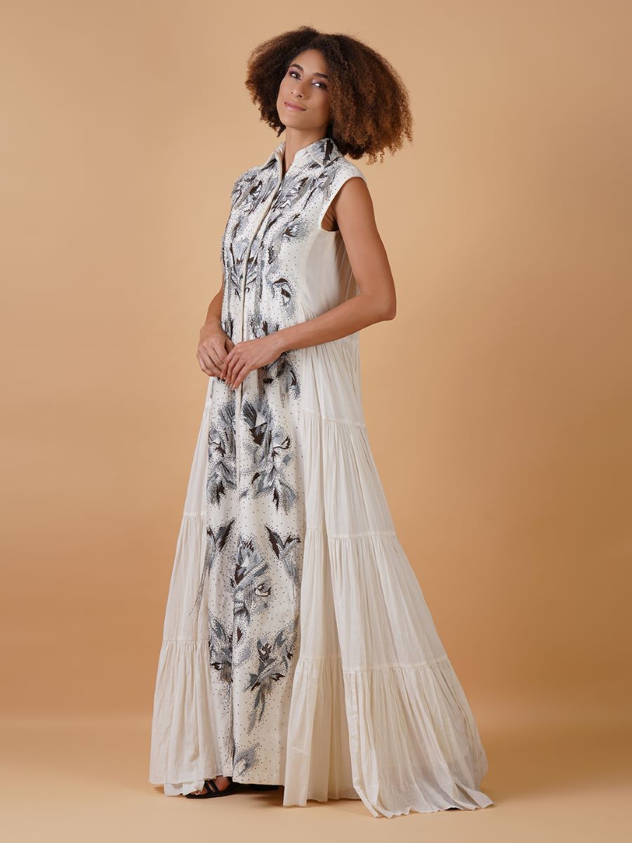 A white cotton tier dress with an embroidered chanderi panel in the front