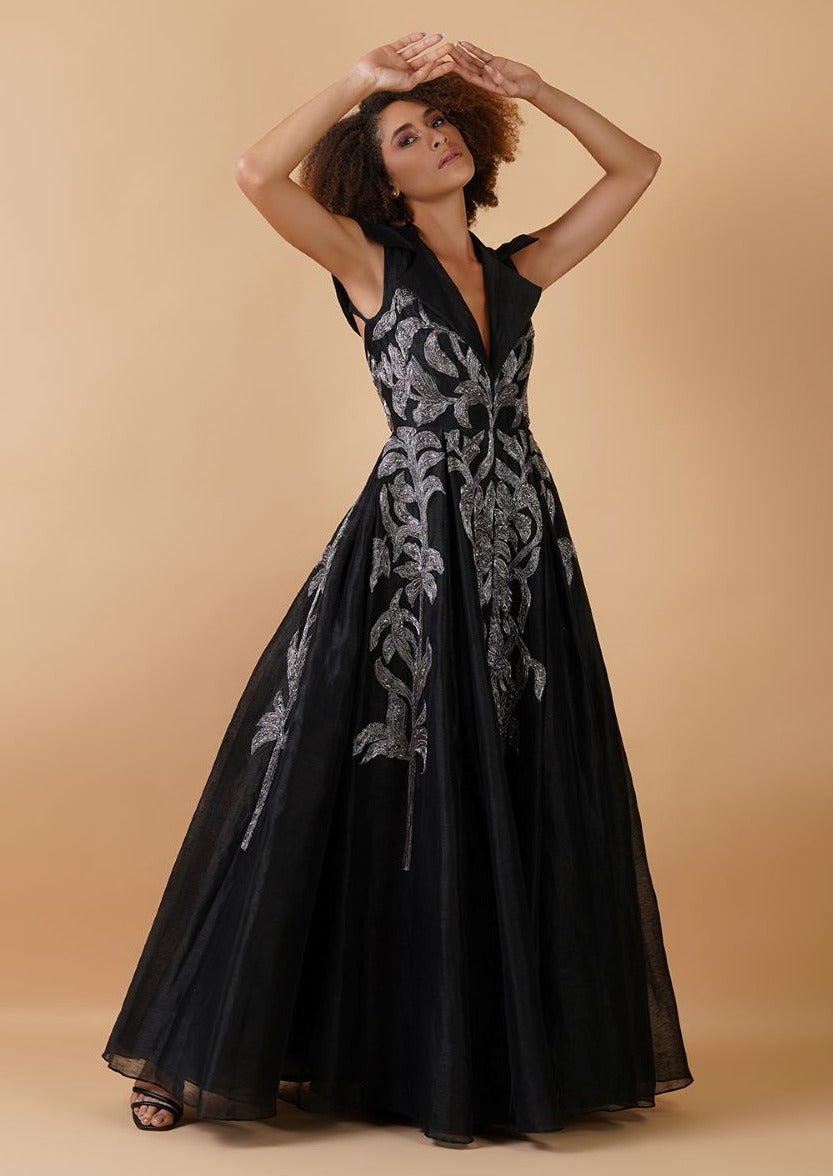A black chanderi floor-length dress that has a plunging V-neck with stylised collar